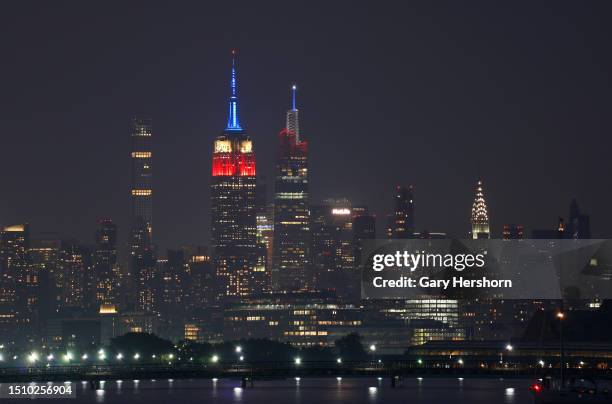 The Empire State Building and One Vanderbilt are illuminated in red, white, and blue to mark the upcoming 4th of July holiday in New York City on...