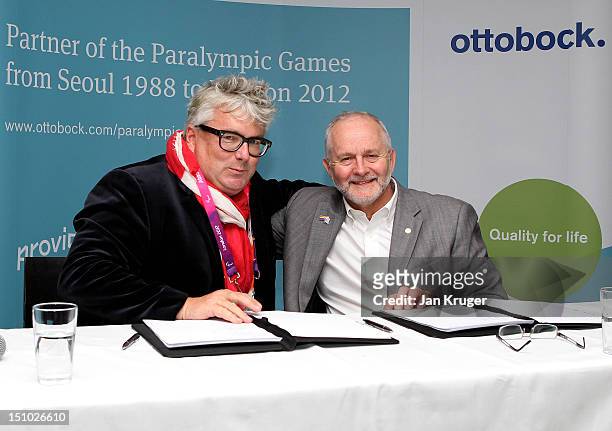 President and CEO of Otto Bock Hans Georg Nader and President of the International Paralympic Committee Sir Phillip Craven pose during the signing of...