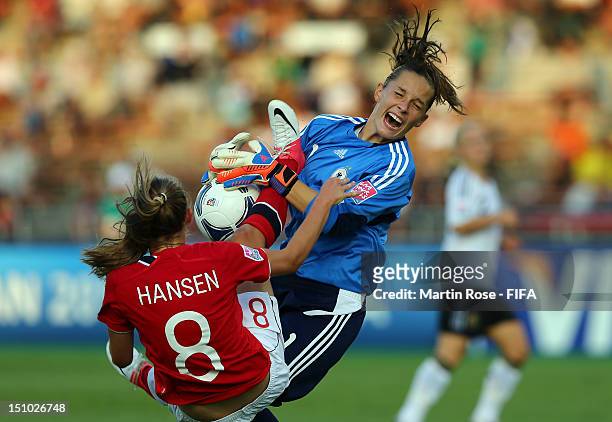 Caroline Hansen of Norway tackles Laura Benkarth, goalkeeper of Germany during the FIFA U-20 Women's World Cup Japan 2012, Quarter Final match...
