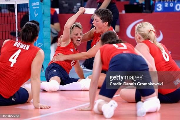 Great Britain players celebrate during the Women's Sitting Volleyball Preliminaries Pool A match between Great Britain and Ukraine on day 2 of the...