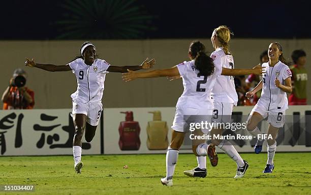 Chioma Ubogagu of USA celebrate with her team mates after she scores her team's 2nd goal during over time during the FIFA U-20 Women's World Cup...