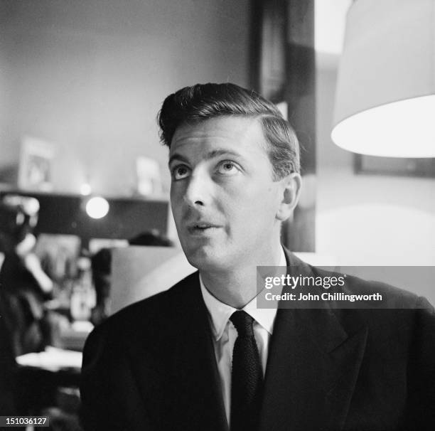 French fashion designer Hubert de Givenchy at his design house at the Plaine Monceau in Paris, 27th October 1955. Original publication: Picture Post...
