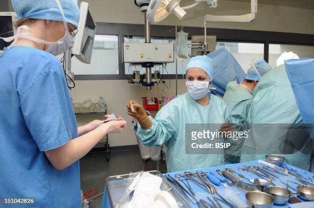 Photo Essay At Lyon Hospital, France. Department Of Urology. Sex Reassignment Sugery Transgender Ftm. Here Hystero Ovariectomy Under Laparoscopy....