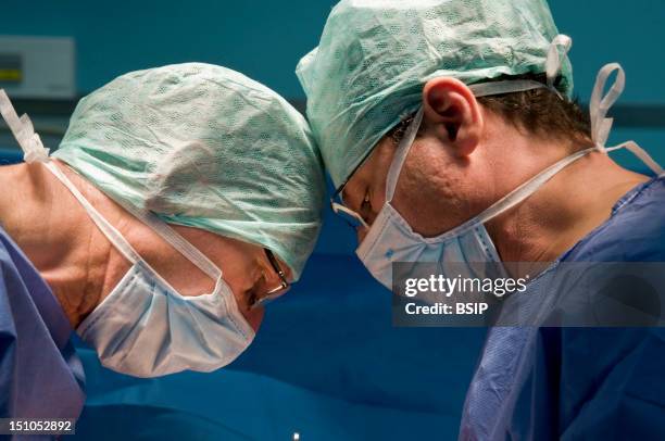 Photo Essay From Hospital. South Francilien Hospital Louise Michel Hospital In Evry, France. Operating Room. Implantation Of An Insulin Pump. Surgeon...