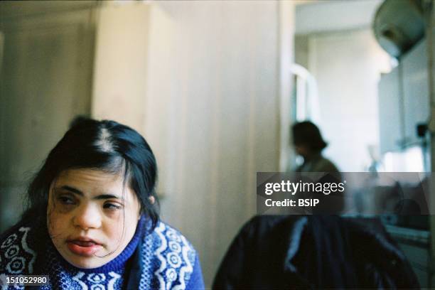 Radia And Her 3 Brothers Live On The 3Rd Floor Of This Building, In A 30M Squared Apartment. Radia Is 22 Years Old. She Has Down's Syndrome And...