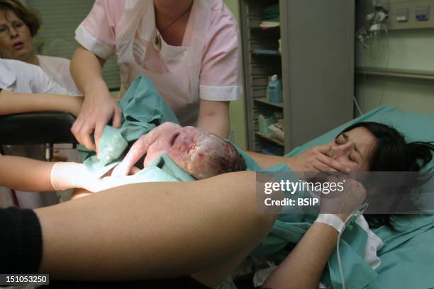 Photo Essay From Clinic. Mother With Newborn, Reims, France.