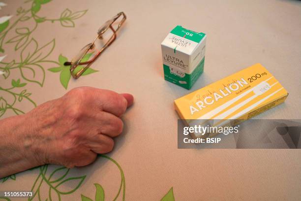 Home Consultation Of A General Practitioner. Hazebrouck, France. On The Table Arcalion And Ultra Levure. Arcalion. Active Substance Sulbutiamine...