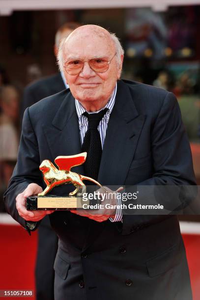 Director Francesco Rosi with his Golden Lion for Lifetime Achievement award during the World Restoration Premiere of "The Mattei Affair" during the...