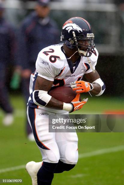 Clinton Portis of the Denver Broncos warms up prior to playing the Oakland Raiders in an NFL football game on November 30, 2003 at the Oakland...