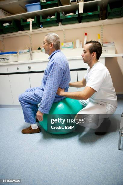 Photo Essay From La Croix Saint Simon Hospital, Paris, France. Department Of Orthopedics. Rehabilitation Exercises With A Physical Therapist After...