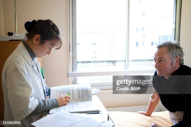 Photo Essay In Rheumatology At La Croix Saint Simon Hospital, Paris, France. Visit Of The Rheumatologist To A Patient Suffering From Polyrheumatoid...