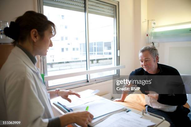 Photo Essay In Rheumatology At La Croix Saint Simon Hospital, Paris, France. Visit Of The Rheumatologist To A Patient Suffering From Polyrheumatoid...