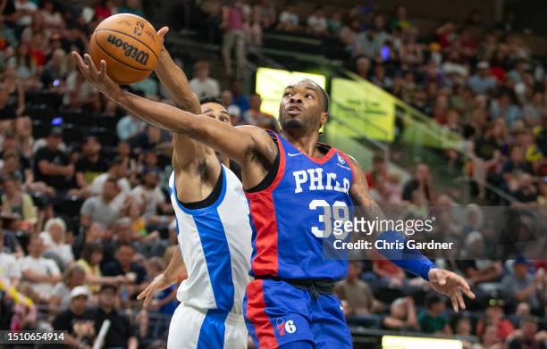 Javonte Smart of the Philadelphia 76ers drives to the basket against Zhaire Smith of the Oklahoma City Thunder during the second half of their NBA...