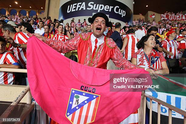 Madrid's supporter is pictured ahead of the UEFA Super Cup football match Chelsea FC versus Club Atletico Madrid, on August 31, 2012 at the Stade...