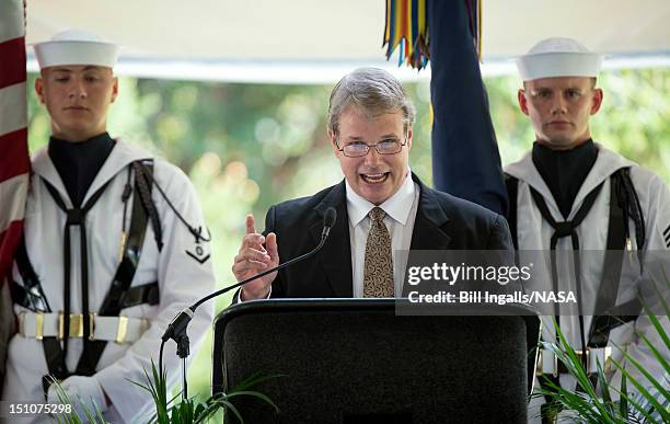 In this handout photo provided by NASA, Mark Armstrong, son of Neil Armstrong, speaks during a memorial service celebrating the life of his father,...