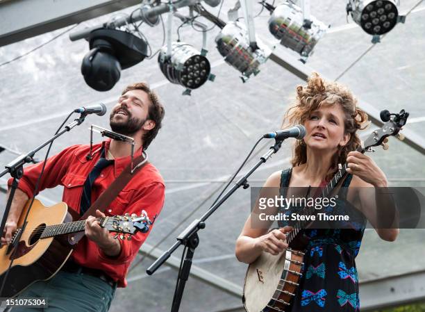 Kai Welch and Abigail Washburn perform on stage during Moseley Folk Festival at Moseley Park on August 31, 2012 in Birmingham, United Kingdom.