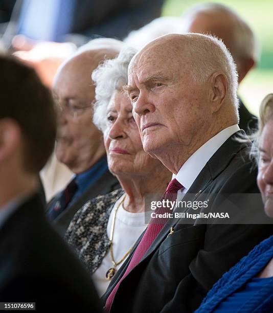 In this handout photo provided by NASA, Sen. John Glenn and his wife Annie listen during a memorial service celebrating the life of Neil Armstrong,...