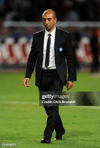 Chelsea manager Roberto Di Matteo looks dejected as he leaves the field at half-time during the UEFA Super Cup match between Chelsea and Atletico...