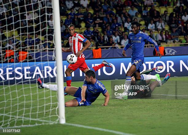 Atletico Madrid's Brazilian defender Joa Miranda de Souza scores a goal during the UEFA Super Cup football match Chelsea FC versus Club Atletico...