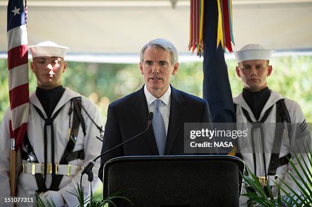 In this handout photo provided by NASA, U.S. Sen. Rob Portman speaks during a memorial service celebrating the life of Neil Armstrong at the Camargo...