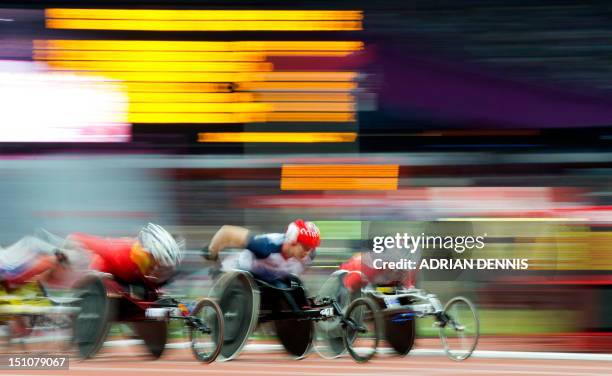 Britain's David Weir competes during the men's 5,000m round 1 T54 athletics event during the London 2012 Paralympic Games at the Olympic Stadium in...