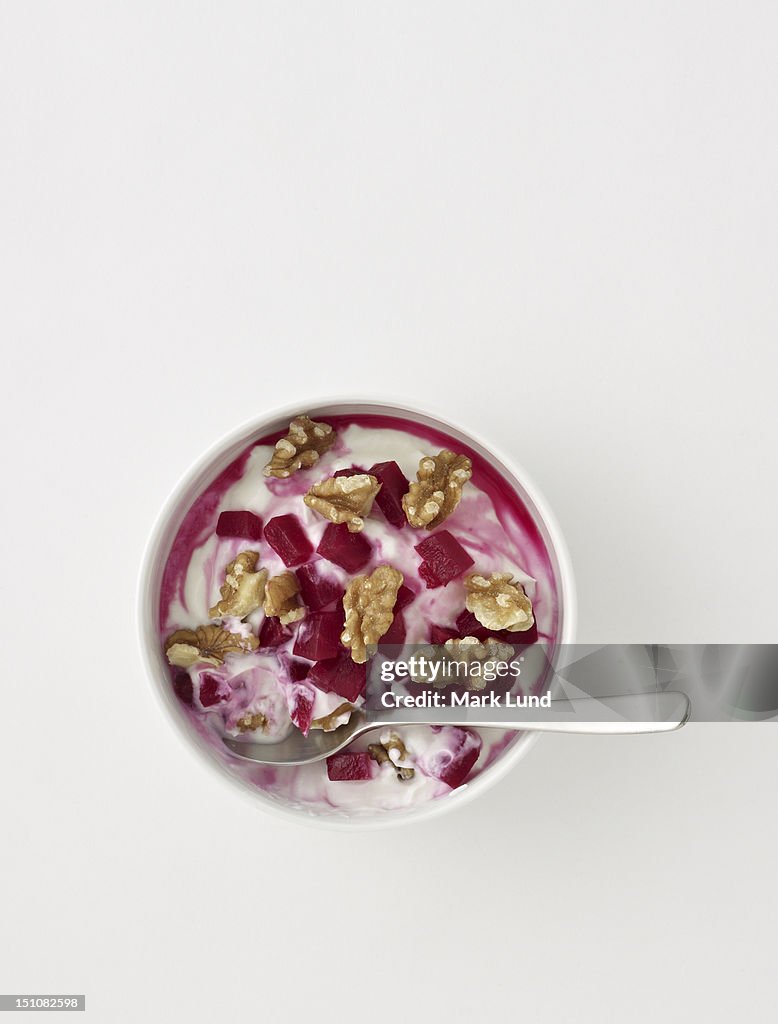 Yogurt and walnuts in a bowl