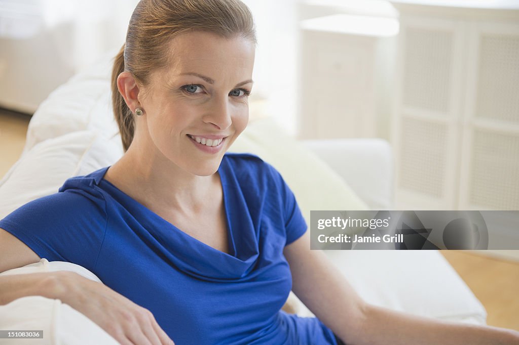 Confident woman at home