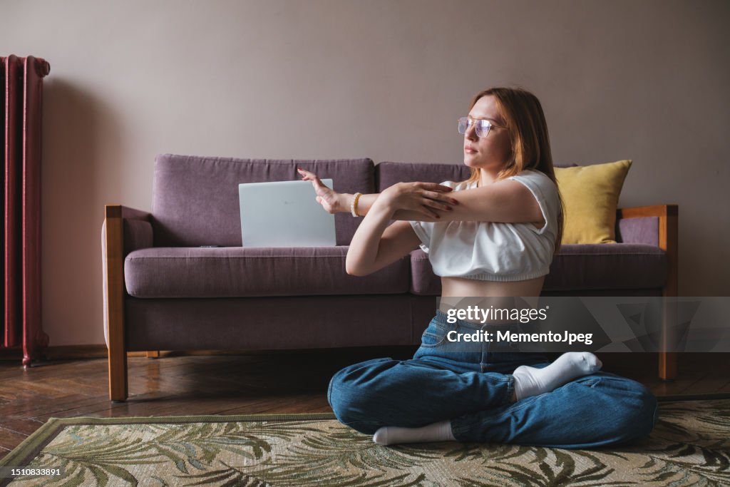 Student Girl Stretching Arms While Studying Online At Home Taking Break ...