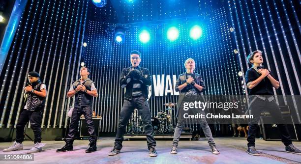 Singers Gabriel Morales, Dana Vaughns, Will Jay, Dalton Rapattoni and Cole Pendery of IM5 perform at Universal CityWalk's free music spotlight series...