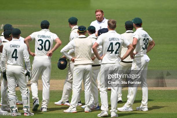 England batsman Jonny Bairstow speaks to the Australia fielders after being given out, stumped by Alex Carey after leaving his crease during the 5th...