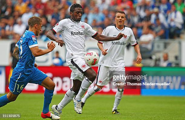 Olivier Occean of Frankfurt fights for the ball with Fabian Johnson of Hoffenheim during the Bundesliga match between 1899 Hoffenheim and Eintracht...