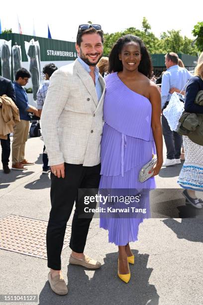 Marius Iepure and Oti Mabuse attend day one of the Wimbledon Tennis Championships at the All England Lawn Tennis and Croquet Club on July 03, 2023 in...