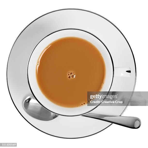 overhead of a cup of tea - tea cup stock-fotos und bilder