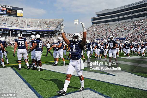 Bill Belton of the Penn State Nittany Lions football team pumps up the crowd before playing the Ohio Bobcats at Beaver Stadium on September 1, 2012...