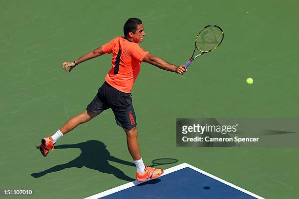 Nicolas Almagro of Spain returns a shot against Jack Sock of the United States during their men's singles third round match on Day Six of the 2012 US...