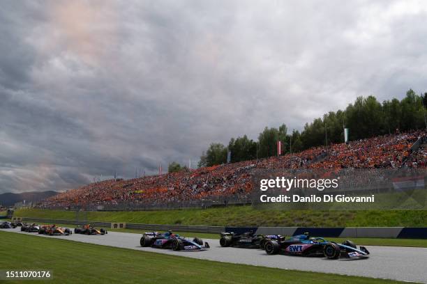 Pierre Gasly of France and Alpine, George Russell of Great Britain and Mercedes, Esteban Ocon of France and Alpine during the F1 Grand Prix of...