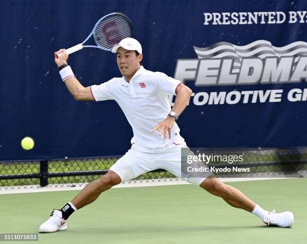 Kei Nishikori of Japan plays his second-round singles match against Denis Kudla of the United States at the Cranbrook Tennis Classic, an ATP...