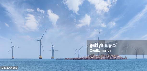 wind power generation is an important means of obtaining energy in modern times - sea islands stock pictures, royalty-free photos & images