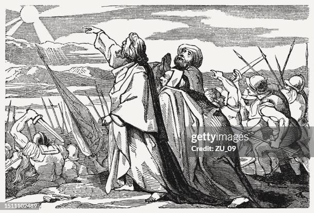 sun and moon stand still (joshua 10), woodcut, published 1835 - old testament stock illustrations