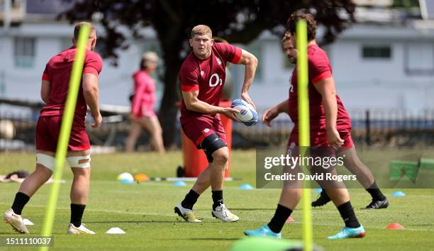 Jack Willis passes the ball during the England training session held at The Lensbury on July 03, 2023 in Teddington, England.