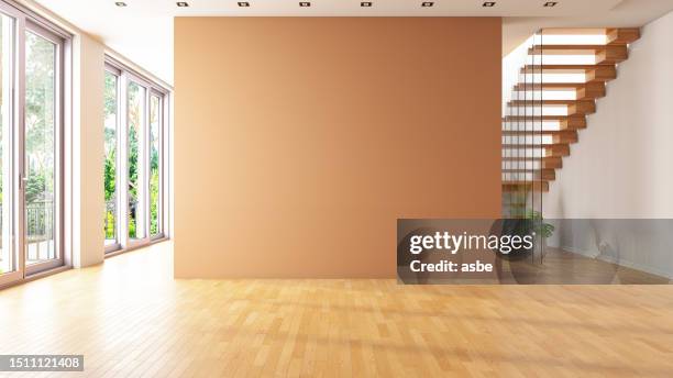 unmöbliertes wohnzimmer mit leerer beiger wand und treppe - wohnzimmer modern stock-fotos und bilder