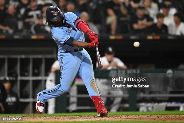 Vladimir Guerrero Jr. #27 of the Toronto Blue Jays hits an RBI double in the seventh inning of game two of a double-header against the Chicago White...