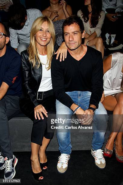 Actress Cayetana Guillen Cuervo and husband attends a fashion show during the Mercedes Benz Madrid Fashion Week Spring/Summer 2013 at Ifema on...