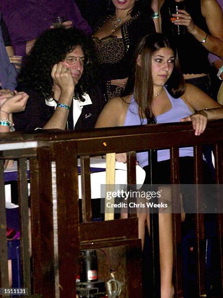 Howard Stern relaxes with his two daughters April 25, 2000 at the House of Blues in Los Angeles. The recent divorcee took his teenage daughters to...