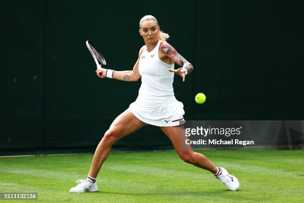Tereza Martincova of Czech Republic plays a forehand against Nadia Podoroska of Argentina in the Women's Singles first round match on day one of The...