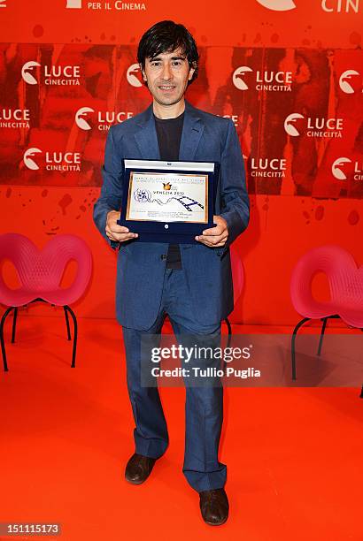 Luigi Lo Cascio with the "Tulipani di Seta Nera Sulla Diversita" award during the 69th Venice Film Festival at the Sala Tropicana di Cinecitta on...