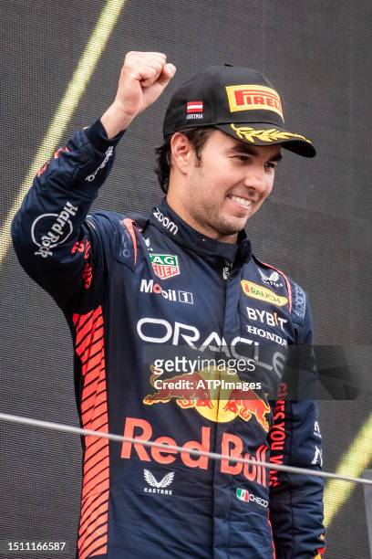 Sergio Perez of Mexico driving the Oracle Red Bull Racing RB19celebrate on podium during the F1 Grand Prix of Austria at Red Bull Ring on July 02,...