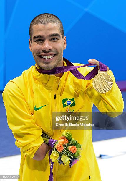 Daniel Dias of Brazil celebrates a gold medal in the Men's 200m freestyle during the 3rd Day of the London 2012 Paralympic Games at Aquatics Centre...