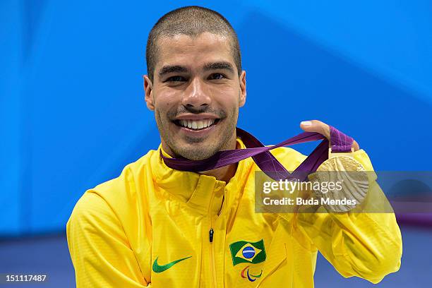 Daniel Dias of Brazil celebrates a gold medal in the Men's 200m freestyle during the 3rd Day of the London 2012 Paralympic Games at Aquatics Centre...