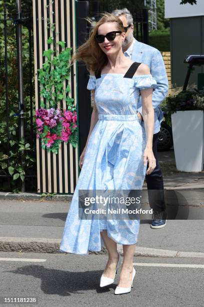 Leslie Mann and Judd Apatow attend the Evian Suite on day one of the Wimbledon Tennis Championships at All England Lawn Tennis and Croquet Club at...